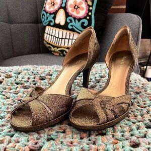 Michelle D size 8 heeled sandals in gold and black.